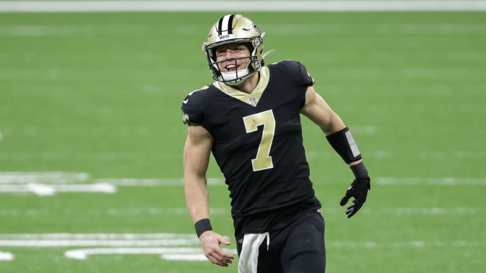 Saints' Taysom Hill celebrates after a big play on the field